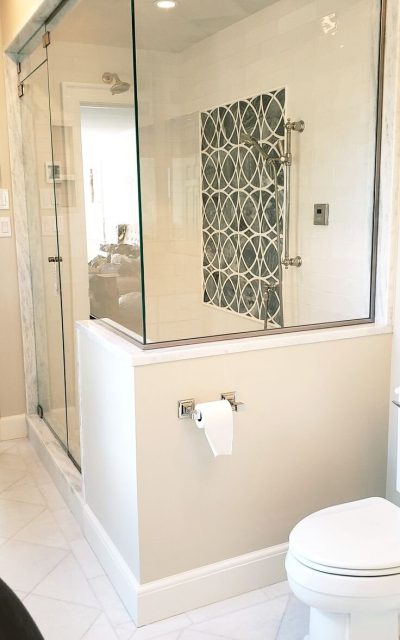 Frameless steam shower enclosure with an operable…